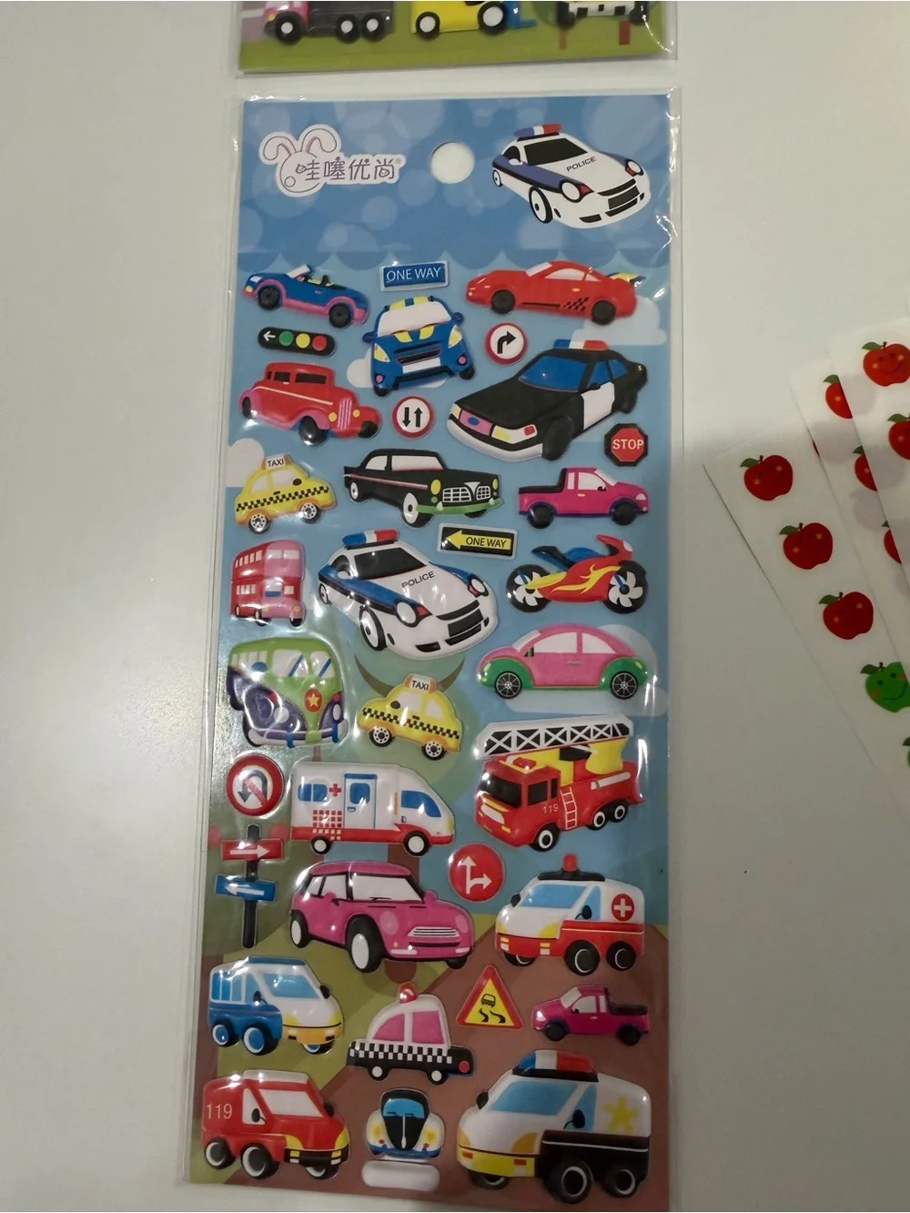 Bundle of back to school apple stickers, googly eyes, & transportation sticker